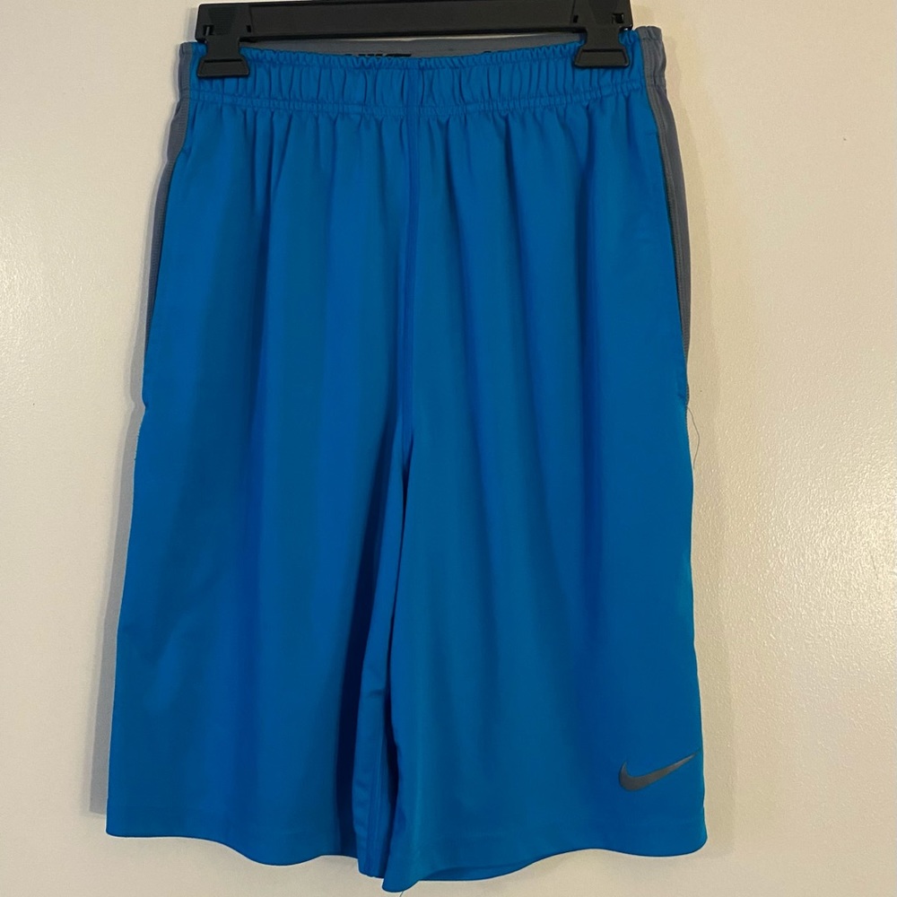Nike Men’s shorts are a size Small
